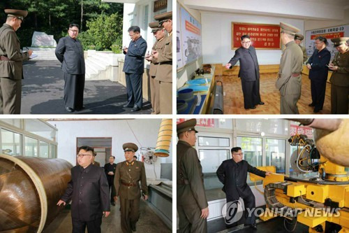 (서울=연합뉴스) 김정은 노동당 위원장이 대륙간탄도미사일(ICBM)급 미사일 소재를 개발·생산하는 국방과학원 화학재료연구소를 시찰했다고 노동당 기관지 노동신문이 23일 보도했다.2017.8.23       [국내에서만 사용가능. 재배포 금지. For Use only in the Republic of Korea. No Redistribution]      nkphoto@yna.co.kr