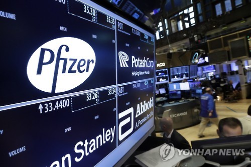 The logo for Pfizer is displayed on a trading post on the floor of the New York Stock Exchange,Thursday, Oct. 29, 2015. Allergan, which makes Botox, jumped 8 percent after saying it has held talks with Pfizer about a sale. (AP Photo/Richard Drew)