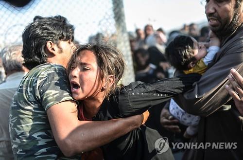 지난해 6월 터키 국경의 시리아 난민 여성(AFP=연합뉴스 자료사진)