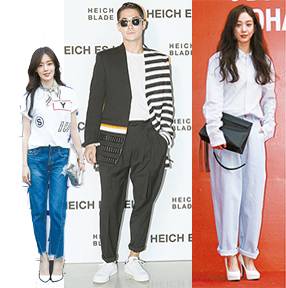 2016 서울패션위크를 찾은 연예계 패셔니스타의 옷차림에서 요즘 유행하는 패션 스타일을 엿볼 수 있다. 흰색 레터링 티셔츠에 밑단이 풀어진 청바지로 캐주얼 룩을 완성한 걸그룹 시크릿의 멤버 한선화, 검정 정장에 선글라스로 포인트를 준 모델 배정남, 연한 하늘색 셔츠에 같은 색상의 통이 넉넉한 청바지를 입어 데님 룩을 선보인 배우 정려원(왼쪽부터).