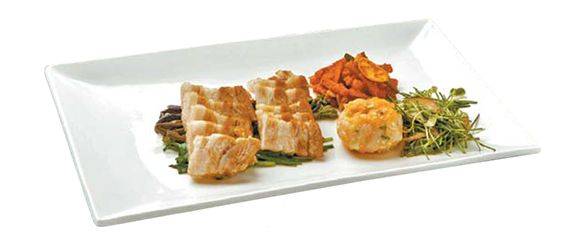 제주산 흑돼지를 활용한 켄싱턴 제주 호텔 한식당 ‘돌미롱’의 돼지고기 요리.