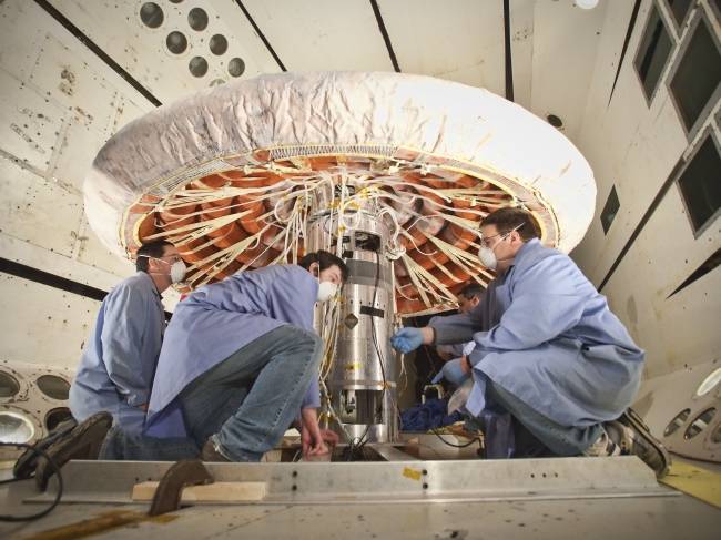 NASA engineers check the inflatable reentry vehicle experiment in Hampton, Virginia. (AP-Yonhap)