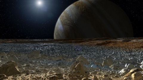 목성의 위성 유로파의 표면에서 바라본 풍경(상상도). 지평선 위에 거대한 모성인 목성이 위용을 자랑하고 있다.