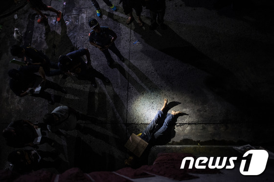 필리핀 마약밀거래 용의자의 시신. © AFP=뉴스1