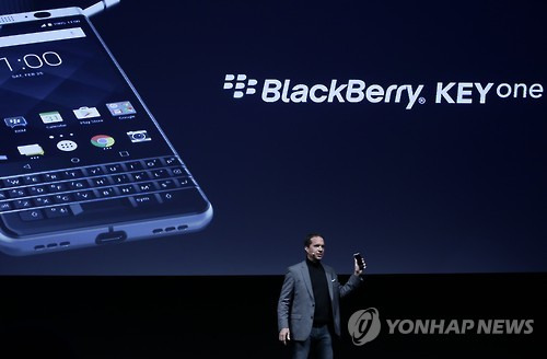 TCL Communication's CEO Nicolas Zibell presents the new BlackBerry KEYone before the Mobile World Congress in Barcelona, Spain, Saturday, Feb. 25, 2017. The Mobile World Congress will be held 27 Feb. to 2 March. (AP Photo/Manu Fernandez)