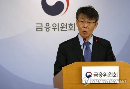 핀테크 브리핑 하는 최훈 금융위 국장 (서울=연합뉴스) 김승두 기자 = 최훈 금융위원회 금융서비스국장이 20일 오전 서울 세종로 정부서울청사에서 핀테크 혁신 활성화 방안에 대한 브리핑을 하고 있다. 2018.3.20