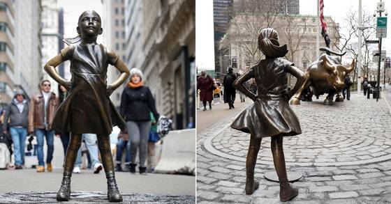 미국 뉴욕 월스트리트에 세워진 '겁 없는 소녀'상. 소녀상 앞엔 '돌진하는 황소'상이 서 있다. [APㆍ로이터=연합뉴스]