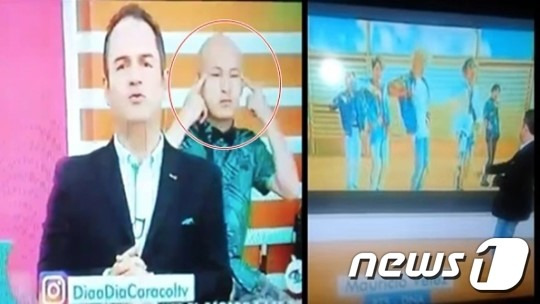 카라클 TV 방송화면 캡처. 영상 속 프로그램 MC는 방탄소년단의 뮤직비디오를 소개하면서 눈을 양 옆으로 찢는 동양인 비하 손동작을 취했다. /사진=뉴스1