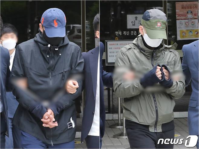 성 착취물을 공유하는 텔레그램 대화방인 'n번방' 유료회원 장 모씨와 임 모씨가 25일 오전 서울 서초구 서울중앙지방법원에서 열린 영장실질심사를 마친 뒤 법정을 나서고 있다. 2020.5.25/뉴스1 © News1 임세영 기자