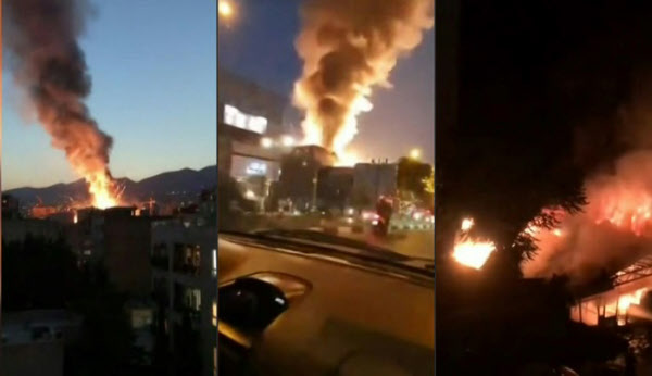 소셜미디어에 공유된 이란 테헤란 보건소 건물 폭발 사고 당시 현장의 모습. 사고 건물에서 짙은 연기가 뿜어져 나오고 있다./AFP연합뉴스