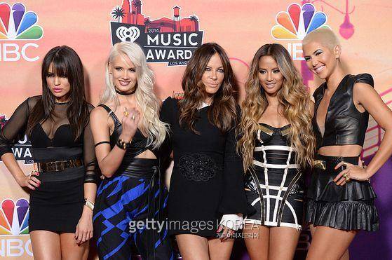 poses in the press room during the 2014 iHeartRadio Music Awards held at The Shrine Auditorium on May 1, 2014 in Los Angeles, California. iHeartRadio Music Awards are being broadcast live on NBC.