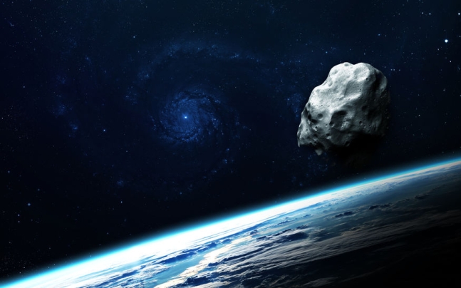 지구로 날아오는 소행성의 그래픽 이미지. 출처=123rf