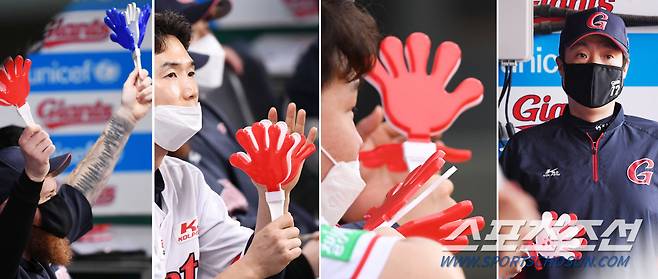 허문회 감독(오른쪽)과 선수들이 짝짝이 응원을 펼치고 있다.