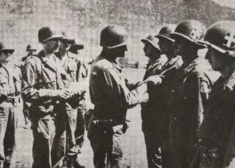 Members of the Greek Hellenic Air Force being decorated by U.S. 1st Cavalry Division during the Korean War. [EMBASSY OF GREECE IN KOREA]