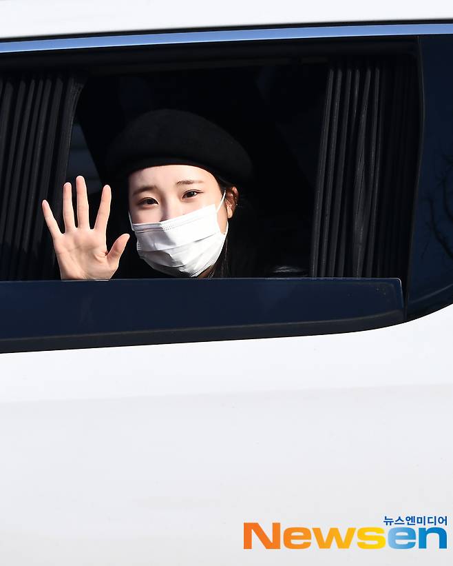 Singer Momoland JooE leaves SBS Mokdong office building after a radio broadcast on December 24.