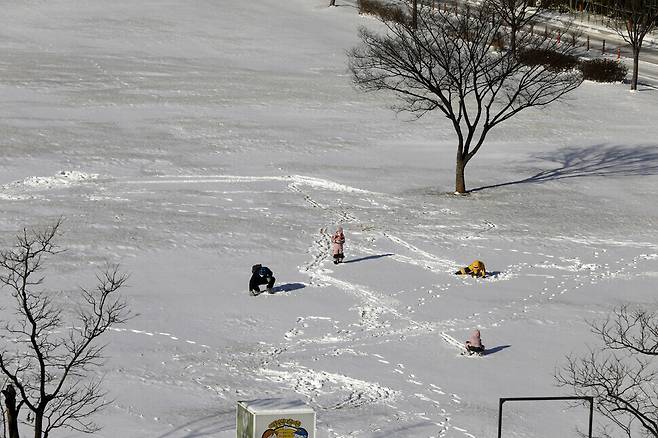 People playing in the snow