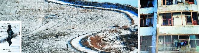 사격 표적판…창문 없는 '누더기 아파트' - 철조망이 설치된 북·중 국경 지대에 사람 모양의 사격 표적판이 세워져 있다. 북한 국경경비대 군인들의 사격 연습용 표적지로, 공포 분위기를 조성해 주민들의 탈북 의지를 꺾으려는 의도로 알려졌다./강동완 동아대 교수 제공