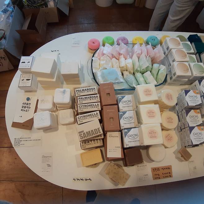 Soap bars for kitchen detergent, hair and body are displayed at Almang Market. (Shin Ji-hye/The Korea Herald)