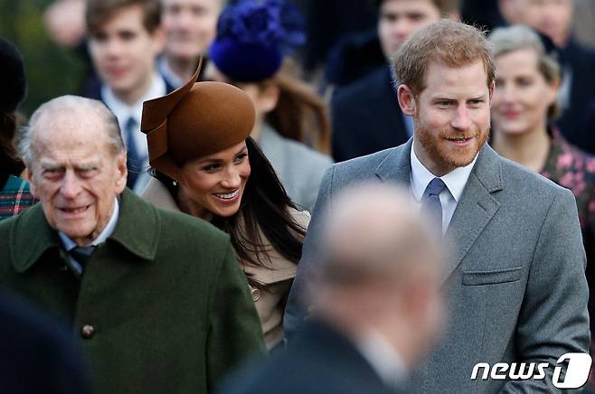 (왼쪽부터) 영국 엘리자베스 2세 여왕의 남편 필립공과 메건 마클 왕자비, 해리 왕자. © AFP=뉴스1