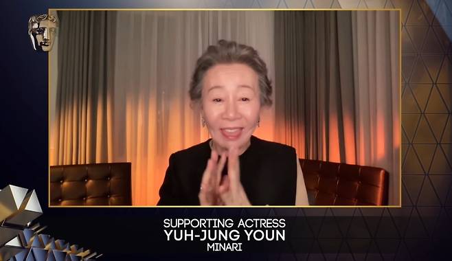 Youn Yuh-jung gives an acceptance speech after winning best supporting actress at the British Academy of Film and Television Arts awards for her role in the American film “Minari” on Monday. (YouTube)