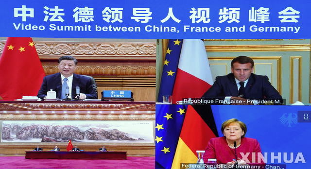 [베이징=신화/뉴시스]시진핑 중국 국가주석(왼쪽부터 시계방향으로), 에마뉘엘 마크롱 프랑스 대통령, 앙겔라 메르켈 독일 총리가 16일 기후변화 화상회의를 진행했다. 2021.4.16.