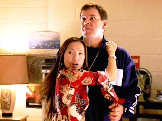 A scene from "Mean Girls," where Asian high school students fight over the school's gym coach. [PARAMOUNT PICTURES]