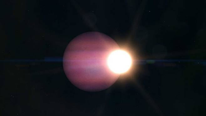 지난해 지구에서 80광년 떨어진 우주에서 발견된 백색왜성(밝은 빛덩어리)과 주변을 공전하는 목성 크기의 행성 상상도. 백색왜성 주변에서 행성이 발견된 사상 첫 사례다. 미국항공우주국(NASA) 제공