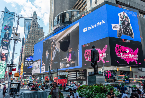 Indie band Se So Neon appears on a billboard in New York City as part of its participation in YouTube Music's Foundry program. [MAGIC STRAWBERRY SOUND]