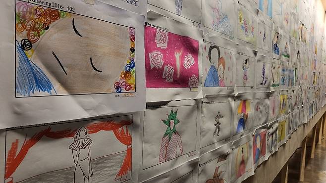 Finished drawings of visitors are on display at the DIY webtoon drawing events. (Kim Hae-yeon/The Korea Herald)