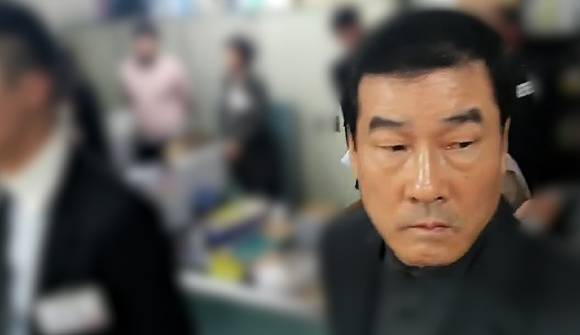 광주 동구 학동 재개발업체 관여 혐의를 받고 있는 문흥식 전 5·18 구속부상자회장 [사진=뉴시스]