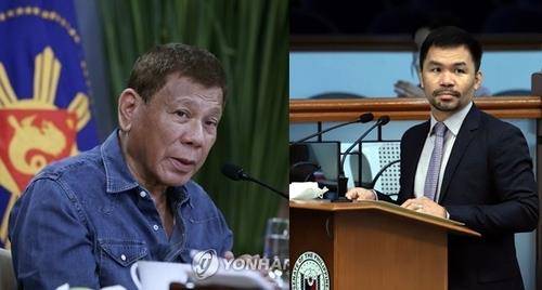 두테르테 대통령(왼쪽)과 복싱영웅이자 상원의원인 파키아오
[AP·인콰이어러=연합뉴스]