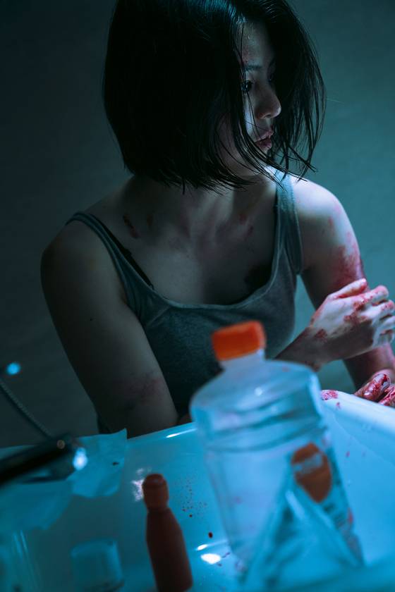 Han appears in the majority of her scenes in "My Name" covered in blood, sweat and tears. [NETFLIX]