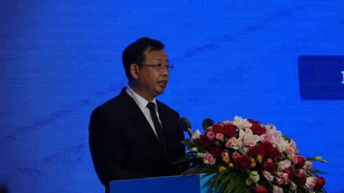 Photo: Li Bin, vice chairman of Guangxi Zhuang Autonomous Region, delivers a speech at the forum. (PRNewsfoto/Xinhua Silk Road)