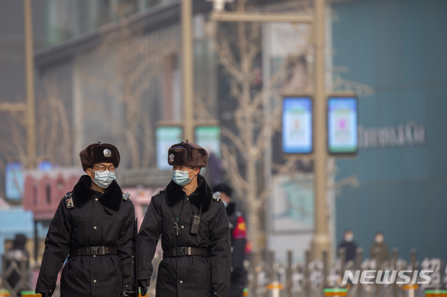 [베이징=AP/뉴시스] 23일(현지시간) 신종 코로나바이러스 감염증(코로나19)이 확산하는 가운데 중국 베이징 거리의 풍경. 2021.01.25.