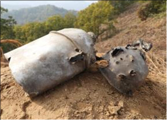 A water canteen riddled with bullet holes (provided by the Ministry of National Defense)