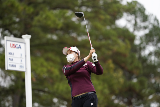 Choi Hye-jin hits off the second tee during the third round of the U.S. Women's Open golf tournament on Dec. 12, 2020, in Houston. [AP/YONHAP]