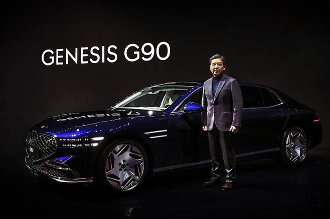 Genesis CEO & President Chang Jae-hoon poses with G90 at media event held at Genesis Suji, Yongin, Tuesday. (Genesis)