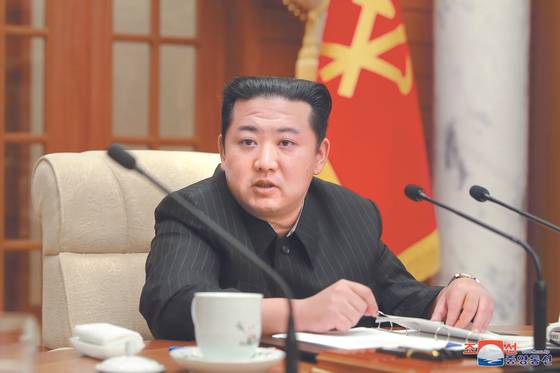 In a photograph released by the North's Korean Central News Agency, North Korean leader speaks at a Korean Workers' Party Politburo meeting in Pyongyang on Wednesday. [YONHAP]