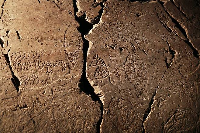 The most ancient rock carvings of whales and whale hunting along with other land animals are expressed on the Bangudae Amgakhwa Petroglyphs in Ulju-gun, in Ulsan, Korea, on a vertical cliff face along the Daegokcheon stream, a tributary to the Taehwa River, which flows into the East Sea. Photo © Hyungwon Kang