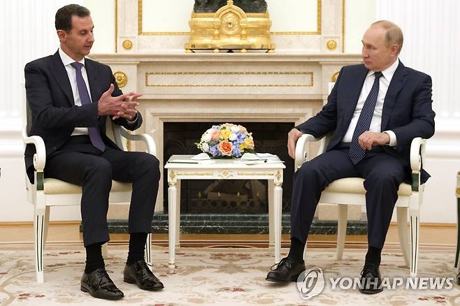 아사드 시리아 대통령과 푸틴 러시아 대통령 [타스=연합뉴스 자료사진]