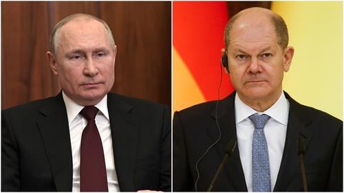푸틴 대통령(왼쪽)과 숄츠 총리 [타스 연합뉴스 자료사진. 재판매 및 DB 금지]