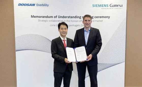 지난 22일 두산에너빌리티와 지멘스가메사가 해상풍력 분야의 전략적 협력을 위한 MOU를 체결했다. [사진 두산에너빌리티]