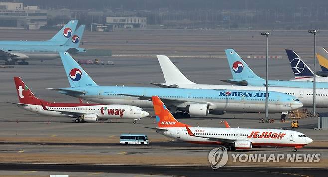 영종도 인천국제공항 주기장의 항공기들 [연합뉴스 자료사진]