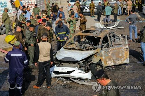 이라크서 발생한 IS 폭탄 테러 [AP 연합뉴스 자료사진. 재판매 및 DB 금지] 기사 내용과 직접 관련 없음.