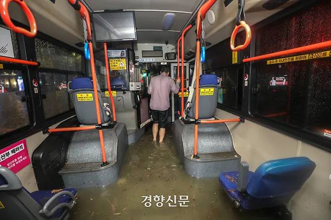 On the night of August 8, when a torrential downpour pounded Seoul, a bus is flooded with water after roads near Daechi Station were flooded. Seong Dong-hun