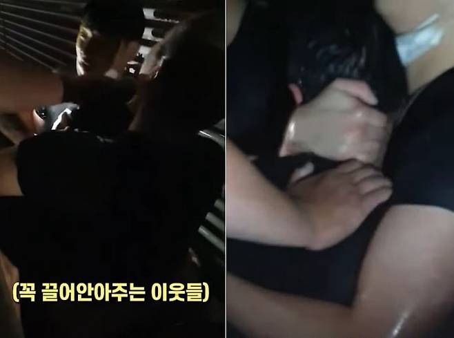 반지하방에 갇힌 이웃을 구조해 낸 의인들이 구조자를 품에 안고 다독이는 모습. /뉴스1 유튜브