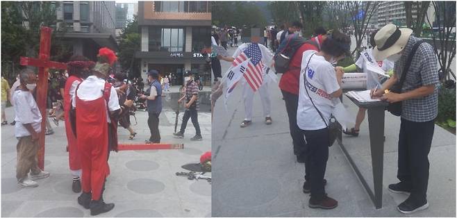 광복절 당일인 15일 오후 일부 시민들은 광화문 광장에서 고대 로마군과 예수 복장을 하고 십자가형을 재현하거나 서명운동을 했다./사진=김성진 기자