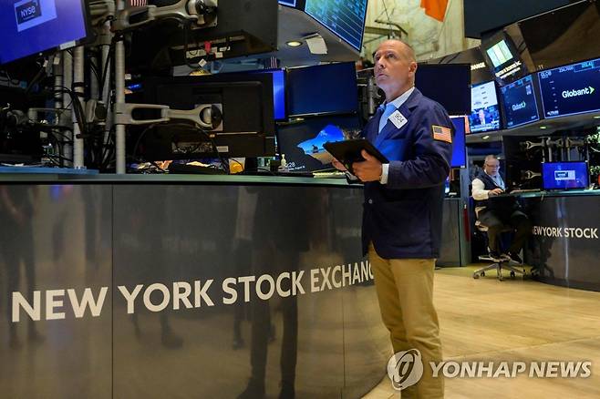 NYSE 입회장에 트레이더의 모습