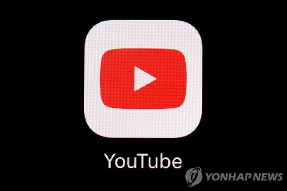 FILE - The YouTube app is displayed on an iPad in Baltimore on March 20, 2018. On Thursday, July 21, 2022, YouTube announced it will begin removing misleading videos about abortion in response to falsehoods being spread about the procedure that is being banned or restricted across a broad swath of the U.S. (AP Photo/Patrick Semansky, File) FILE PHOTO