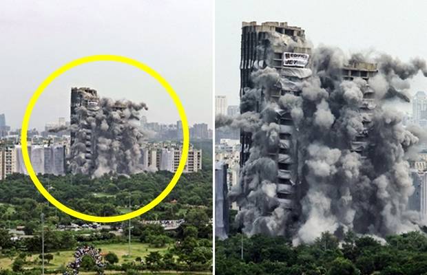 28일(현지시간) 인도 수도 뉴델리 외곽의 위성도시 노이다에서 주거용 고층 건물 두 동이 폭파 해체됐다. 로이터 연합뉴스